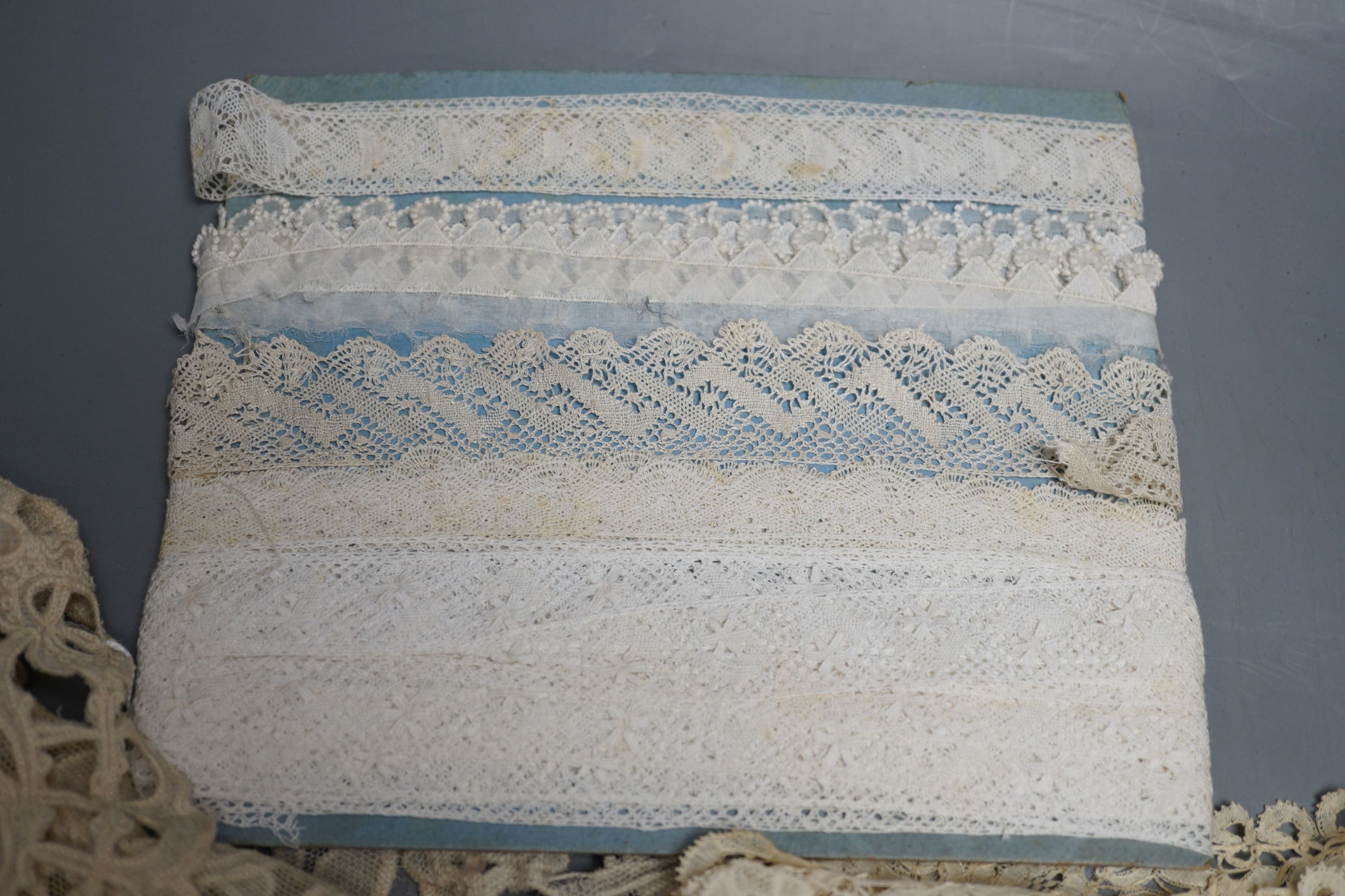 A lace bolero, a small collection of lace collars, trimmings etc